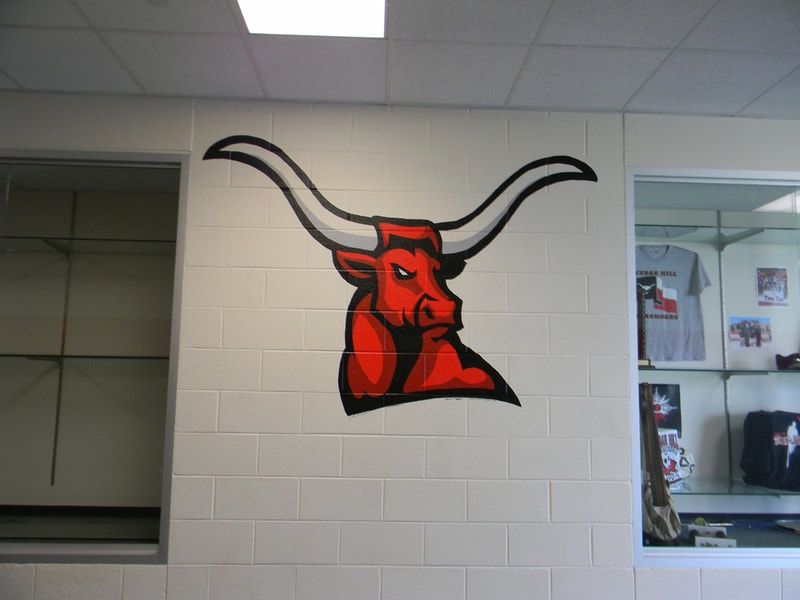 Client: 9th Grade Center Athletic Wing/Hall , CHISD, Cedar Hill, TX
Size: 1 Large CH Logo, Approx. 4.5 ftH x 6 feet W 
Scope: Part of a district beautification campaign for the district. The Athletic depart. sponsored payment of the semi-full district project.