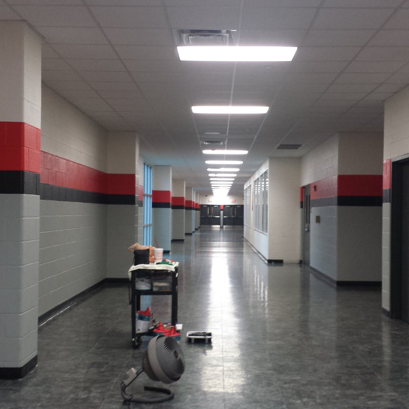 Client: 9th Grade Center Athletic Wing/Hall , CHISD, Cedar Hill, TX
Size: Approx. 100+ feet of striping 
Scope: Part of a district beautification campaign for the district. The Athletic depart. sponsored payment of the semi-full district project.