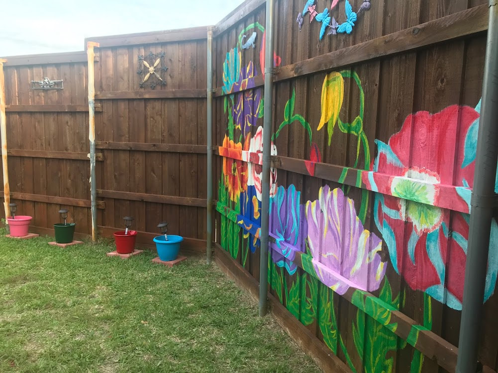 Client & Location: Private Residence, Cedar Hill, TX
Size: Approx. 7-8ft W X 6 ft H, 
Scope: Client had just finished a major gardening renovation and wanted a floral themed mural in their backyard.