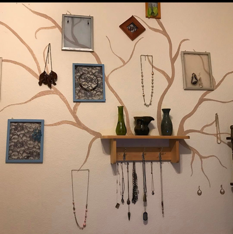 Client & Location: Private Residence, Cedar Hill, TX
Size: Approx. 5 W X 4 ft H, 
Scope: Client had a large collection of jewelry and wanted a creative yet functional way of displaying and organizing the jewelry. In addition to the painted tree branches, I created frames with fabric that allowed for items to be hung from them.